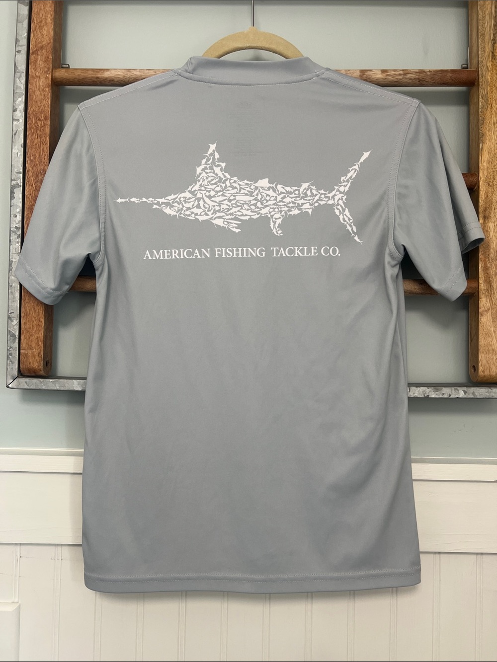 Boys Aftco performance T-shirt, size medium